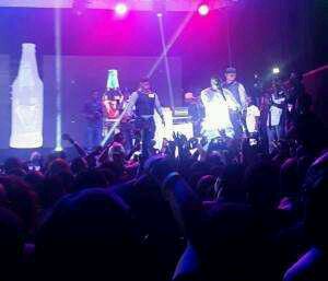 LOL… Fans Throw Water & Drinks At Olamide On Stage, See His Reaction