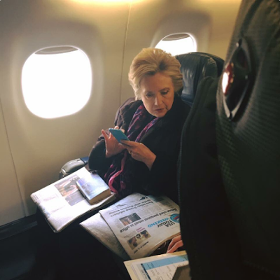 Photo of Hillary Clinton reading about Mike Pence using a private email account has gone viral