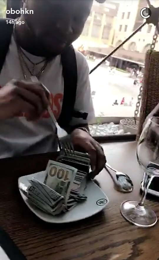 See what Davido is doing with dollars