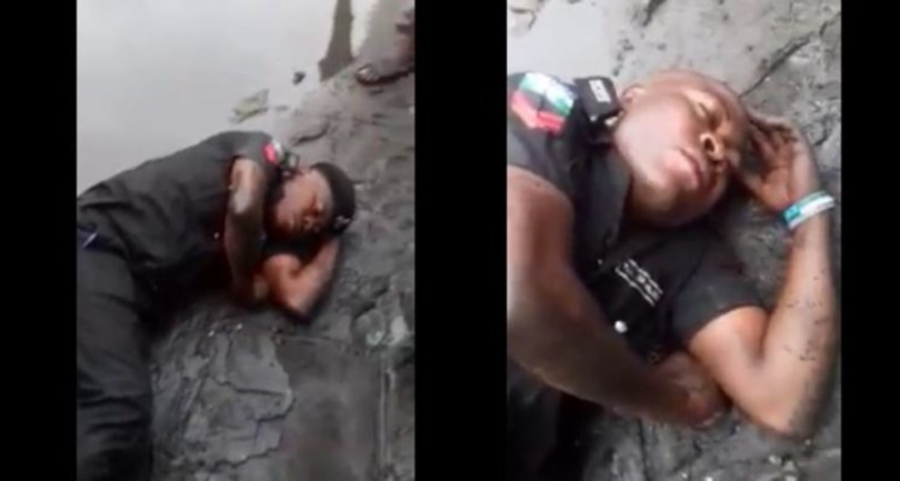 Viral Video: Drunk Nigerian Policeman Caught Sleeping In Mud