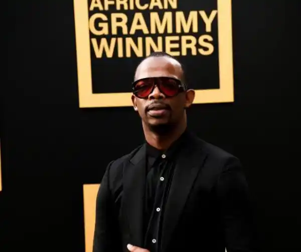 Zakes Bantwini visits late mother’s grave with his Grammy award (Photo)